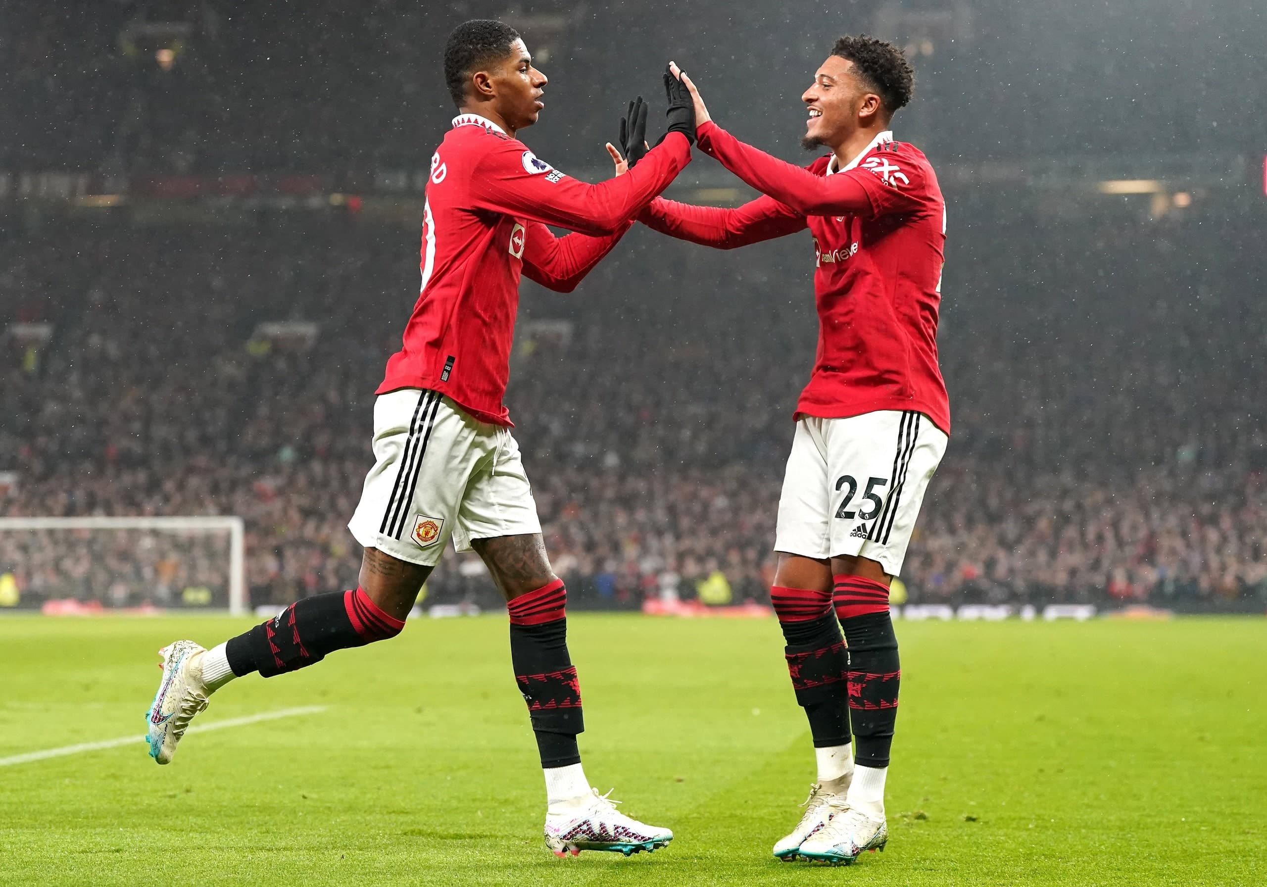 Manchester United, ManU v Brentford - Premier League - Old Trafford Manchester United s Marcus Rashford (left) celebrates scoring their side s first goal of the game with team-mate Jadon Sancho during the Premier League match at Old Trafford, Manchester. Picture date: Wednesday April 5, 2023. EDITORIAL USE ONLY No use with unauthorised audio, video, data, fixture lists, club/league logos or live services. Online in-match use limited to 120 images, no video emulation. No use in betting, games or single club/league/player publications. PUBLICATIONxNOTxINxUKxIRL Copyright: xNickxPottsx 71647020