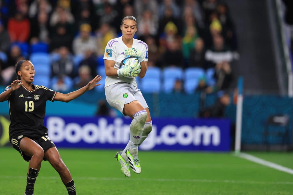 France versus Jamaica; Rebecca Spencer of Jamaica leaps to cut out